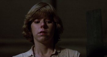 Movie still from “Friday the 13th” (1980), directed by Sean S. Cunningham – A young woman with blonde hair and a white shirt; Close Up shot, Low angle