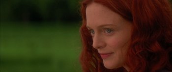 Movie still from “From Hell” (2001), directed by Allen Hughes – A person with red hair and blue eyes; Close Up shot, Over the shoulder angle