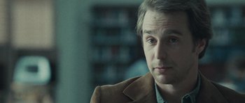 Movie still from “Frost/Nixon” (2008), directed by Ron Howard – A person wearing a jacket; Close Up shot, Over the shoulder angle