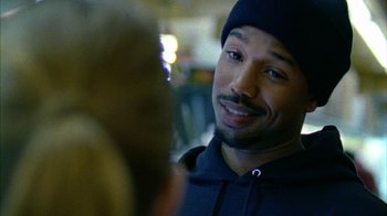 Movie still from “Fruitvale Station” (2013), directed by Ryan Coogler – A person talking to another person; Close Up shot, Over the shoulder angle