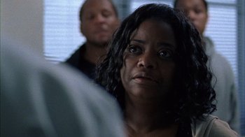 Movie still from “Fruitvale Station” (2013), directed by Ryan Coogler – A person looking at the camera; Close Up shot, Over the shoulder angle