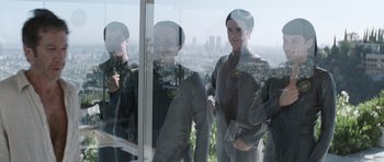 Movie still from “Galaxy Quest” (1999), directed by Dean Parisot – A group of people standing in front of a window; Medium shot, Over the shoulder angle