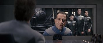 Movie still from “Galaxy Quest” (1999), directed by Dean Parisot – A man is looking at himself in the mirror; Medium shot, Over the shoulder angle