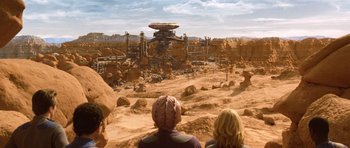 Movie still from “Galaxy Quest” (1999), directed by Dean Parisot – Two people are looking out over a desert landscape; Extreme Wide shot, High angle