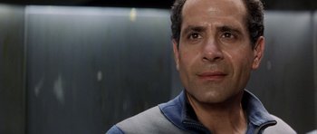 Movie still from “Galaxy Quest” (1999), directed by Dean Parisot – A man's face in front of a wall; Close Up shot, Over the shoulder angle