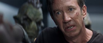 Movie still from “Galaxy Quest” (1999), directed by Dean Parisot – A person with a face; Close Up shot, Over the shoulder angle