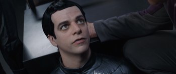 Movie still from “Galaxy Quest” (1999), directed by Dean Parisot – A man with his hand on his head touching his face; Close Up shot, Over the shoulder angle