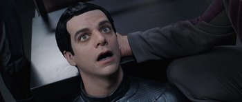 Movie still from “Galaxy Quest” (1999), directed by Dean Parisot – A man with his head touching another man's ear; Close Up shot, Over the shoulder angle