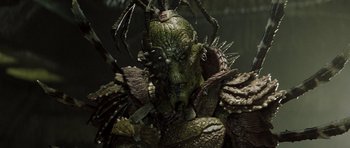 Movie still from “Galaxy Quest” (1999), directed by Dean Parisot – The head of an alien creature; Close Up shot, Low angle