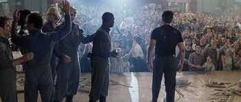 Movie still from “Galaxy Quest” (1999), directed by Dean Parisot – A group of men standing in front of a crowd; Wide shot, Low angle