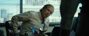 Movie still from “Hell or High Water” (2016), directed by David Mackenzie – An older man sitting in front of a computer; Close Up shot, Low angle