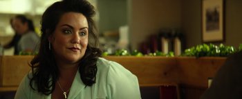 Movie still from “Hell or High Water” (2016), directed by David Mackenzie – A person sitting at a table; Close Up shot, Over the shoulder angle