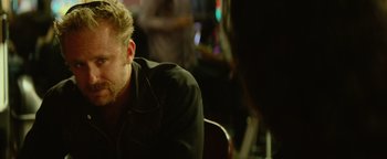 Movie still from “Hell or High Water” (2016), directed by David Mackenzie – A person sitting in a chair; Close Up shot, Over the shoulder angle