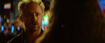 Movie still from “Hell or High Water” (2016), directed by David Mackenzie – A person with a blurry background; Close Up shot, Over the shoulder angle