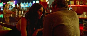 Movie still from “Hell or High Water” (2016), directed by David Mackenzie – A woman sitting next to a man at a table; Close Up shot, Over the shoulder angle