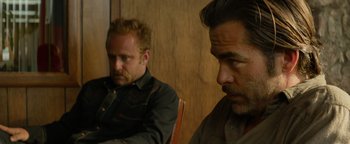 Movie still from “Hell or High Water” (2016), directed by David Mackenzie – Two men sitting next to each other in a room; Close Up shot, Over the shoulder angle