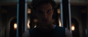 Movie still from “Hellraiser” (2022), directed by David Bruckner – A young man is looking into the camera; Close Up shot, Low angle