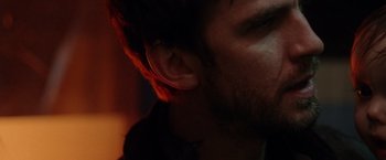 Movie still from “Her Smell” (2018), directed by Alex Ross Perry – A man's ear and ear lobe; Extreme Close Up shot, Over the shoulder angle