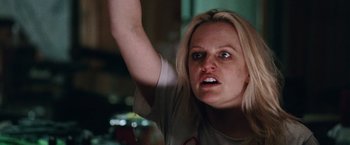 Movie still from “Her Smell” (2018), directed by Alex Ross Perry – A person with a hand up in the air; Close Up shot, Low angle