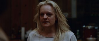 Movie still from “Her Smell” (2018), directed by Alex Ross Perry – A person with long blonde hair; Close Up shot, Low angle