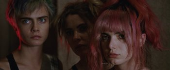 Movie still from “Her Smell” (2018), directed by Alex Ross Perry – Two women with pink hair looking at the camera; Close Up shot, Low angle