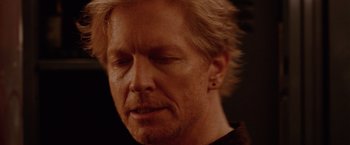 Movie still from “Her Smell” (2018), directed by Alex Ross Perry – A person wearing a black shirt; Close Up shot, Overhead angle