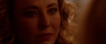 Movie still from “Her Smell” (2018), directed by Alex Ross Perry – A woman's eyes and hair; Close Up shot, Over the shoulder angle