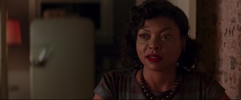 Movie still from “Hidden Figures” (2016), directed by Theodore Melfi – A person wearing a necklace; Close Up shot, Over the shoulder angle