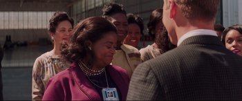 Movie still from “Hidden Figures” (2016), directed by Theodore Melfi – A group of women standing next to each other; Close Up shot, Over the shoulder angle