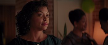 Movie still from “Hidden Figures” (2016), directed by Theodore Melfi – A person looking at a camera; Close Up shot, Over the shoulder angle
