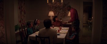 Movie still from “Hidden Figures” (2016), directed by Theodore Melfi – A group of people sitting around a table at a restaurant; Medium shot, High angle