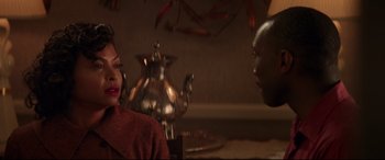Movie still from “Hidden Figures” (2016), directed by Theodore Melfi – A man and a woman sitting in front of a tea pot; Close Up shot, Over the shoulder angle