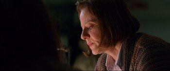 Movie still from “Hitman: Agent 47” (2015), directed by Aleksander Bach – A person with short brown hair; Close Up shot, Over the shoulder angle