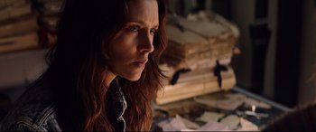 Movie still from “Hitman: Agent 47” (2015), directed by Aleksander Bach – A person with long red hair; Close Up shot, High angle