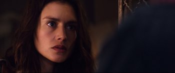 Movie still from “Hitman: Agent 47” (2015), directed by Aleksander Bach – A person with long hair; Close Up shot, Over the shoulder angle