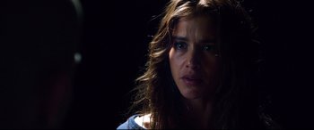 Movie still from “Hitman: Agent 47” (2015), directed by Aleksander Bach – A person with long brown hair; Close Up shot, Over the shoulder angle