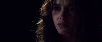 Movie still from “Hitman: Agent 47” (2015), directed by Aleksander Bach – A person with a tear in her eye; Close Up shot, Low angle