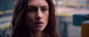 Movie still from “Hitman: Agent 47” (2015), directed by Aleksander Bach – A person with long hair; Close Up shot, Over the shoulder angle