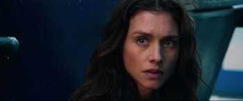 Movie still from “Hitman: Agent 47” (2015), directed by Aleksander Bach – A person with long hair; Close Up shot, Low angle