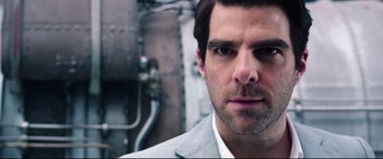 Movie still from “Hitman: Agent 47” (2015), directed by Aleksander Bach – A person wearing a suit and tie; Close Up shot, Low angle