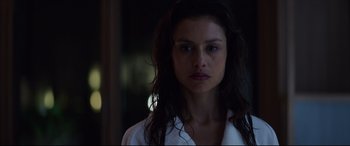 Movie still from “Hitman: Agent 47” (2015), directed by Aleksander Bach – A person wearing a white shirt; Close Up shot, Low angle