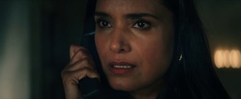 Movie still from “Gen V” (2023), created by Eric Kripke – A person talking on a cell phone; Close Up shot, High angle