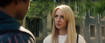 Movie still from “Gen V” (2023), created by Eric Kripke – A woman with long blonde hair looking at the camera; Close Up shot, Over the shoulder angle