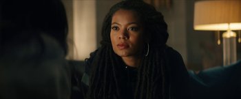 Movie still from “Gen V” (2023), created by Eric Kripke – A person with dreadlocks; Close Up shot, Over the shoulder angle
