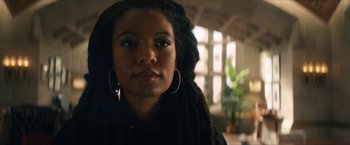 Movie still from “Gen V” (2023), created by Eric Kripke – A person with dreads; Close Up shot, Low angle