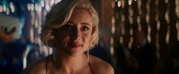 Movie still from “Gen V” (2023), created by Eric Kripke – A person with short blonde hair; Close Up shot, Over the shoulder angle