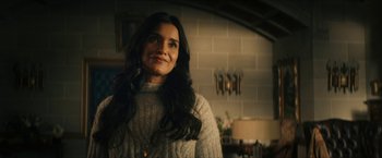 Movie still from “Gen V” (2023), created by Eric Kripke – A woman standing in front of a brick wall; Close Up shot, Over the shoulder angle