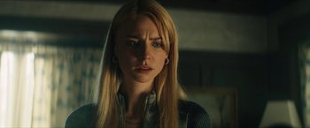 Movie still from “Gen V” (2023), created by Eric Kripke – A woman with long blonde hair looking sad; Close Up shot, Low angle