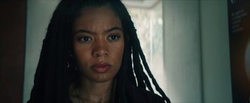 Movie still from “Gen V” (2023), created by Eric Kripke – A person with dreads; Close Up shot, Low angle