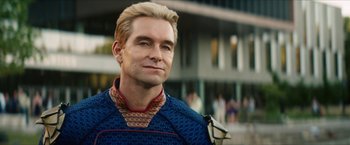 Movie still from “Gen V” (2023), created by Eric Kripke – A person wearing a sweater; Close Up shot, Over the shoulder angle